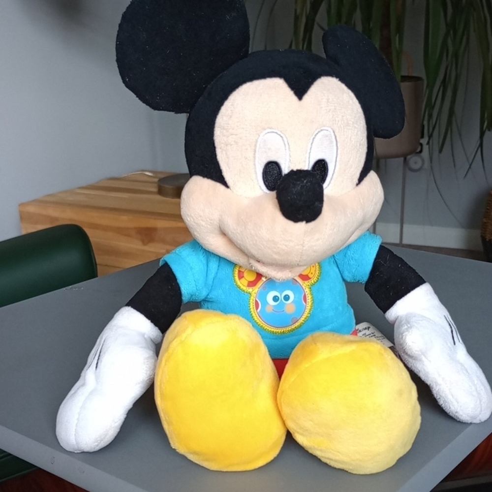 Disney Singing **** Mickey Mouse Plush Toy Black, White, Yellow, Blue Tee Shirt.